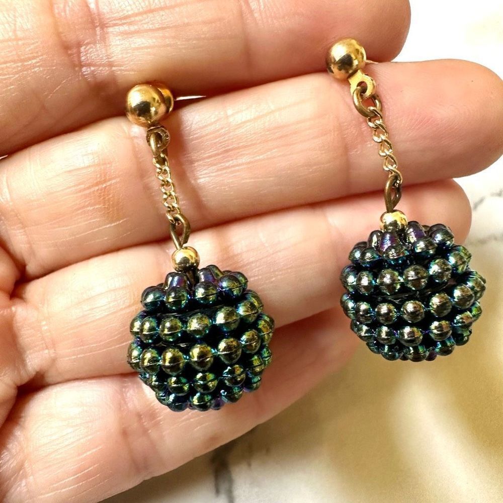 Gold tone blue iridescent ball drop earrings